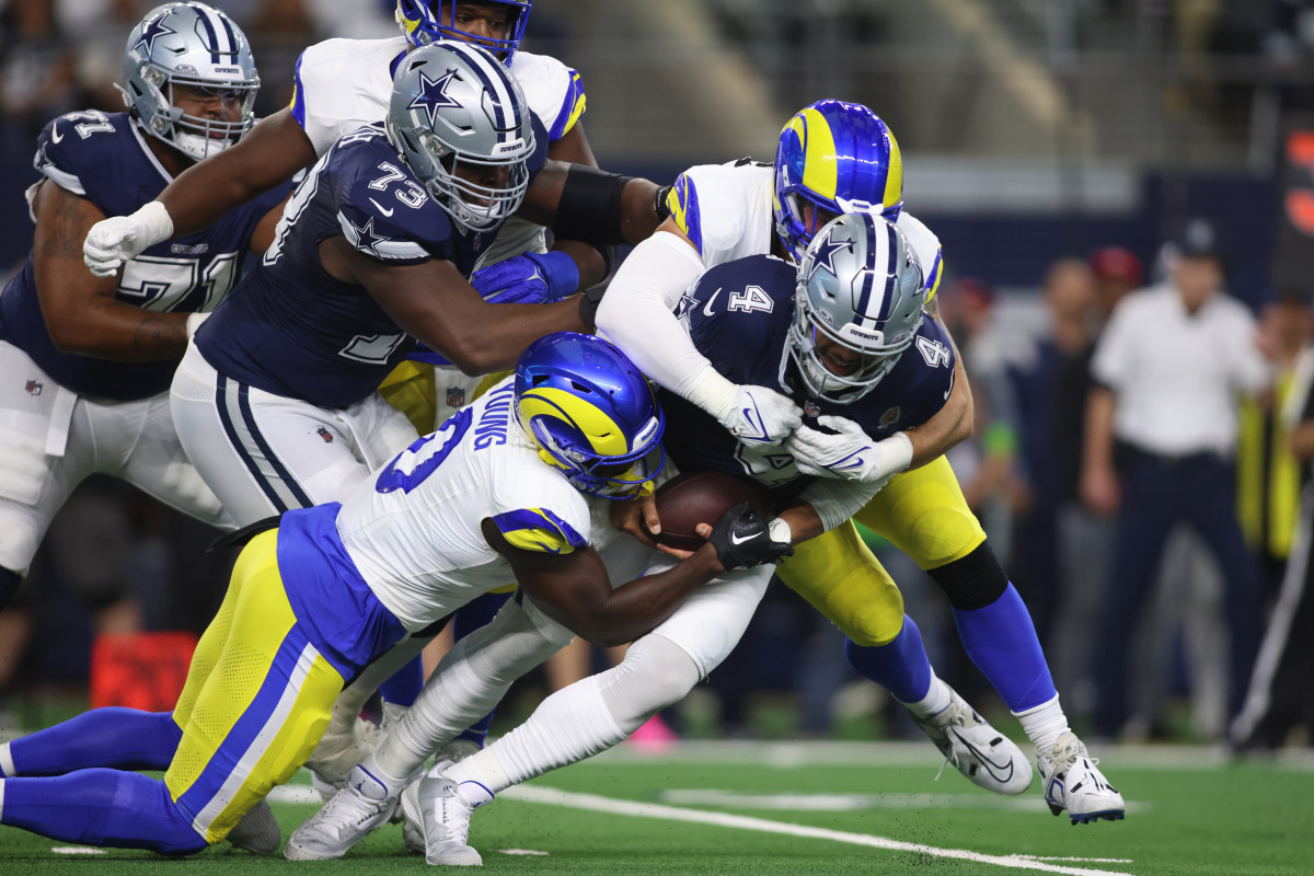 Dallas Cowboys quarterback Dak Prescott is sacked by Los Angeles Rams. Mandatory Credit: Tim Heitman-USA TODAY Sports