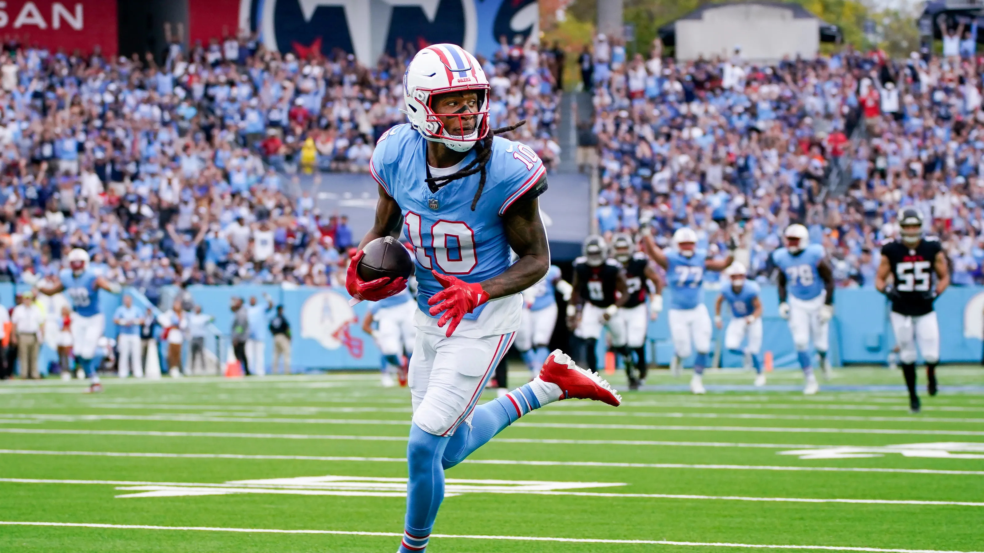 Almost Patriots receiver DeAndre Hopkins broke out with three touchdown catches last week for Tennessee.