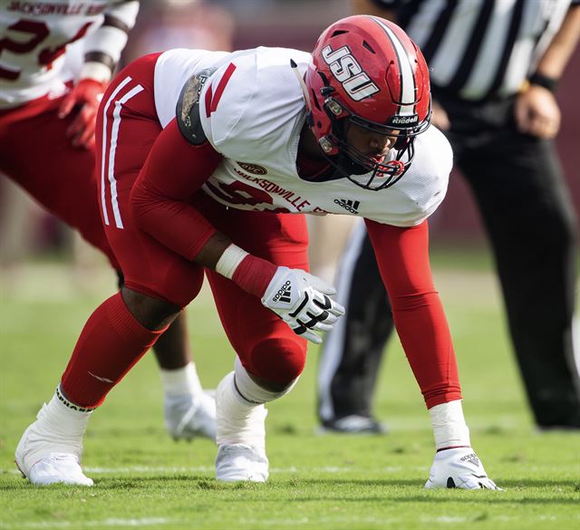 Defensive Linemen Chris Hardie getting set before a play