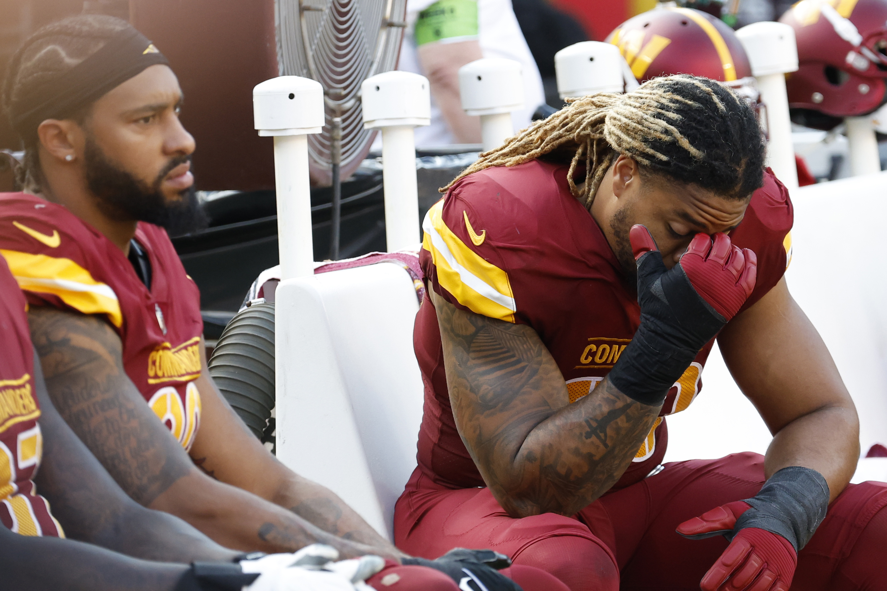 The Washington Commanders traded Montez Sweat (left) and Chase Young (right) this week. 