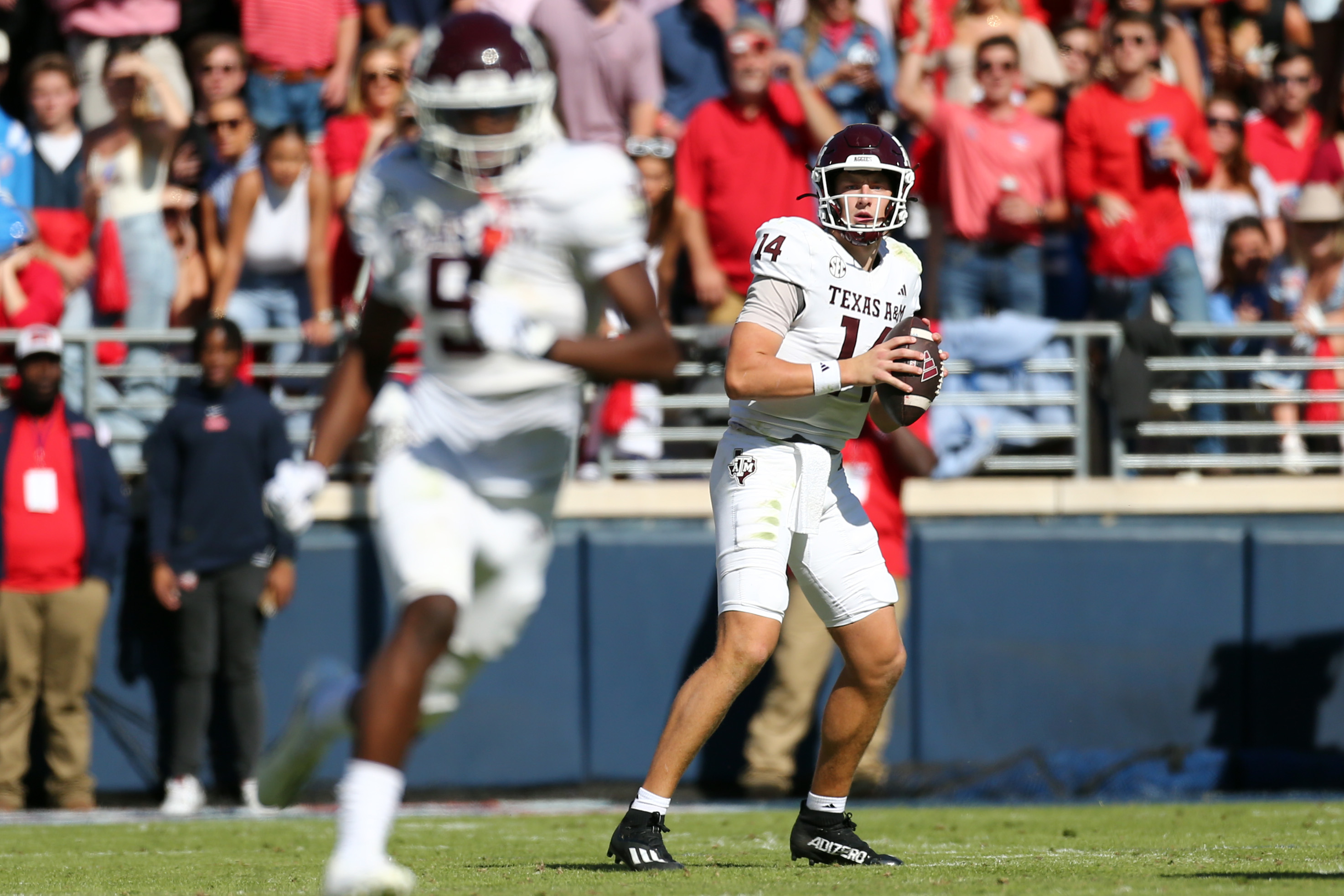 Texas A&M quarterback Max Johnson throws a pass at Vaught-Hemingway Stadium against Ole Miss