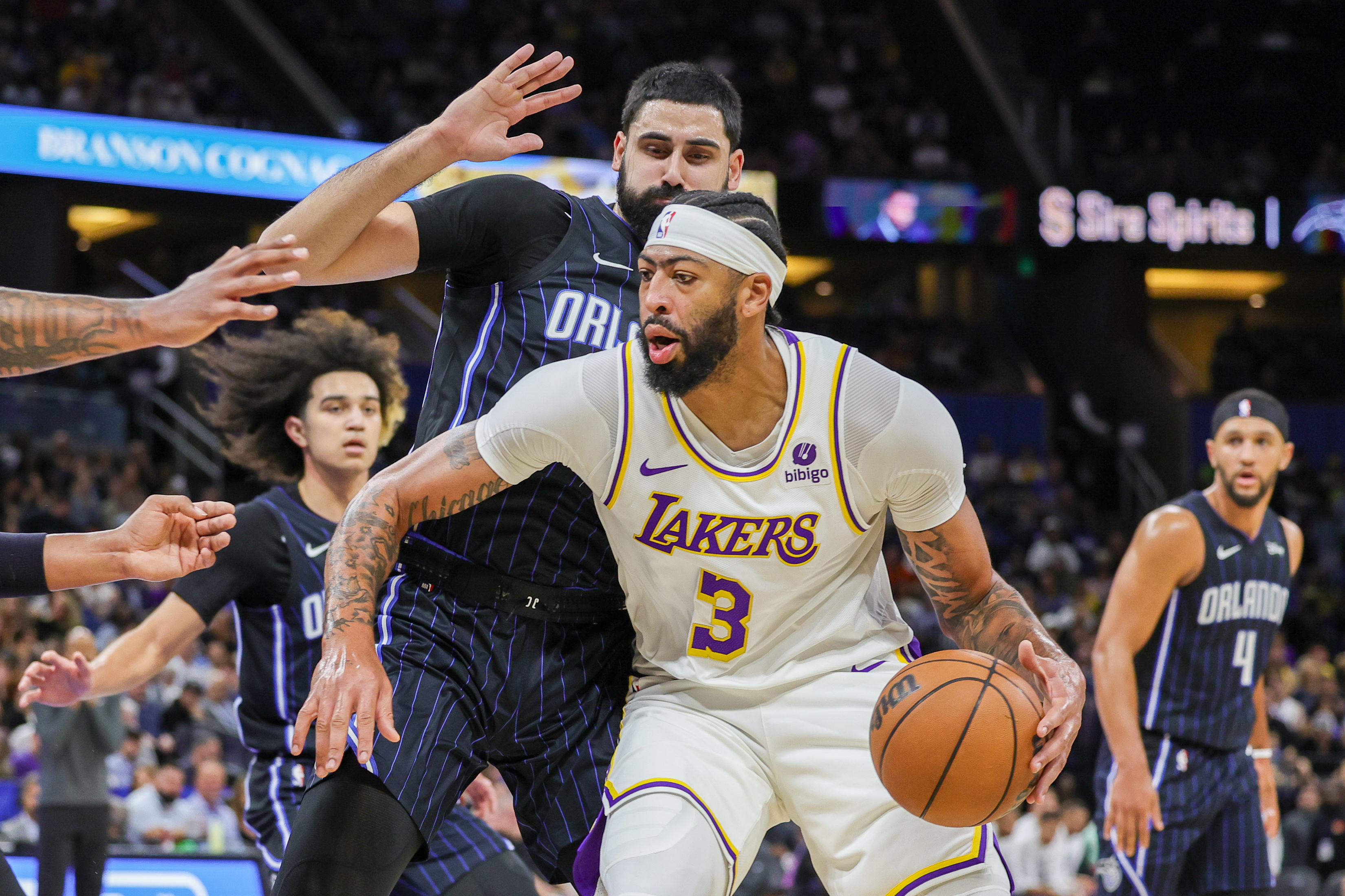 Los Angeles Lakers forward Anthony Davis (3) drives to the basket against Orlando Magic center Goga Bitadze (35) during the first quarter at Amway Center.