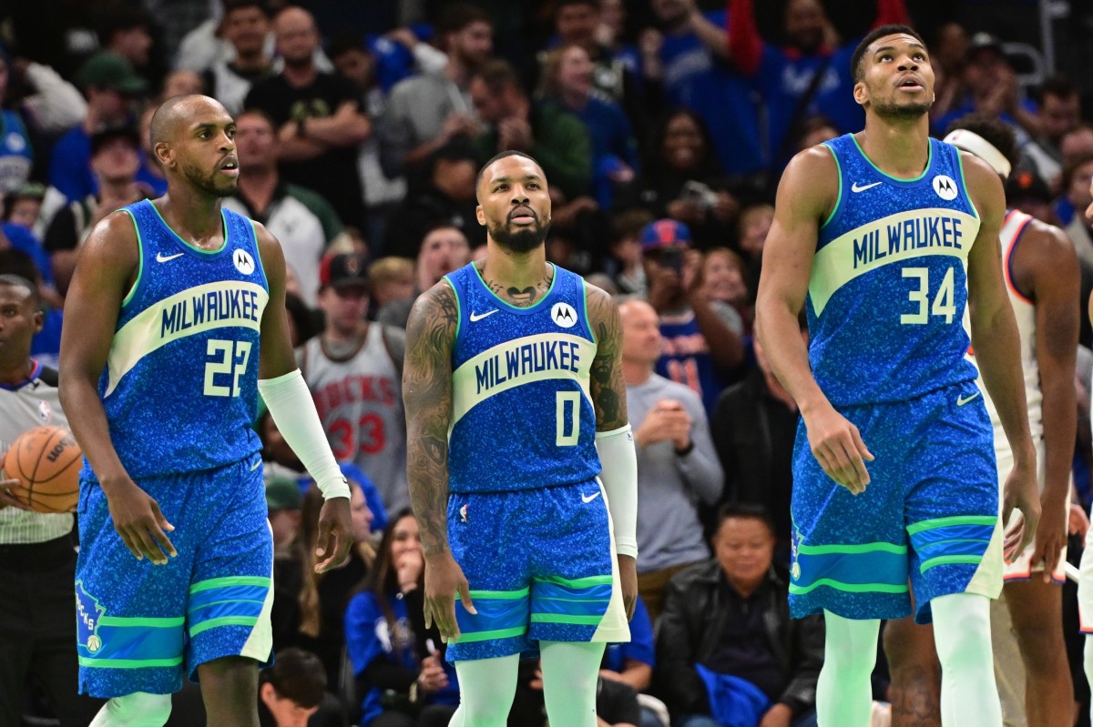 Milwaukee Bucks center Khris Middleton (22), guard Damian Lillard (0) and forward Giannis Antetokounmpo (34) 