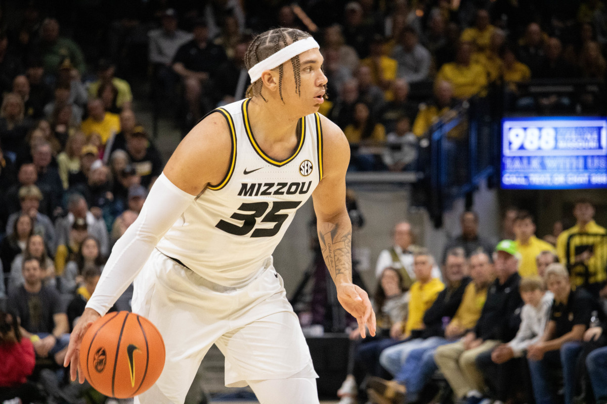 Noah Carter handles the ball at the top of the key against Memphis on Friday, Nov. 10 at Mizzou Arena. 