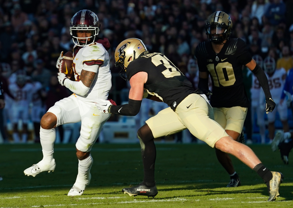 Nov 11, 2023; West Lafayette, Indiana, USA; Minnesota Golden Gophers wide receiver Daniel Jackson (9) catches a pass against Purdue Boilermakers defensive back Dillon Thieneman (31) during the first half at Ross-Ade Stadium.