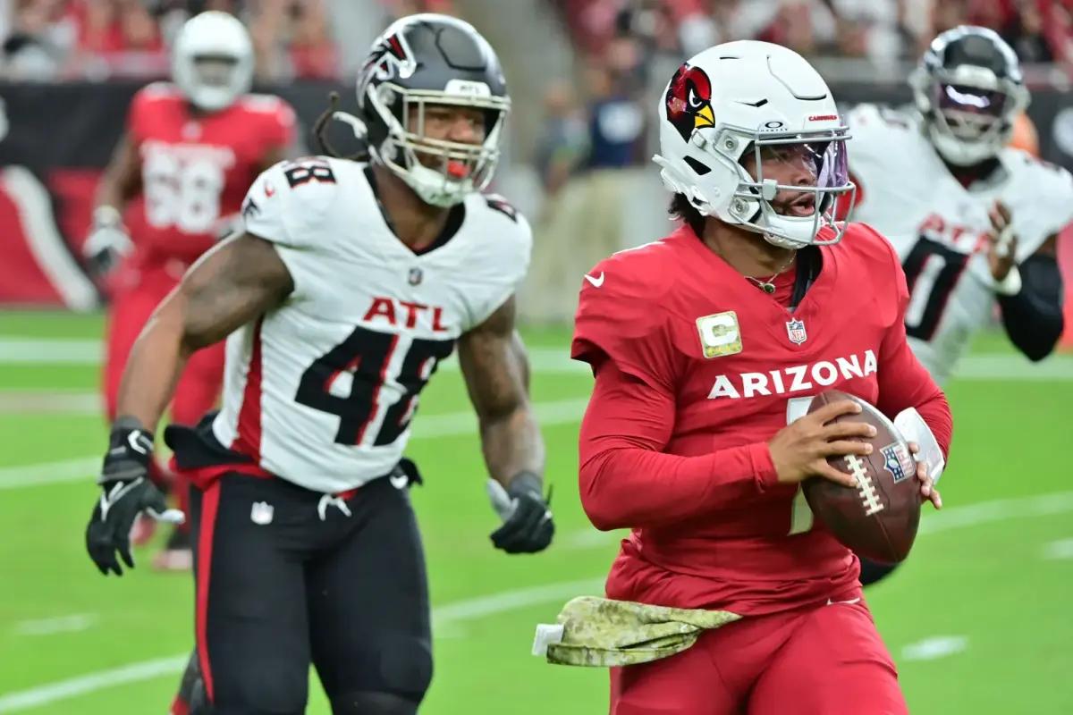 Nov 12, 2023; Glendale, Arizona, USA; Arizona Cardinals quarterback Kyler Murray (1) is chased by Atlanta Falcons linebacker Bud Dupree (48) in the first half at State Farm Stadium