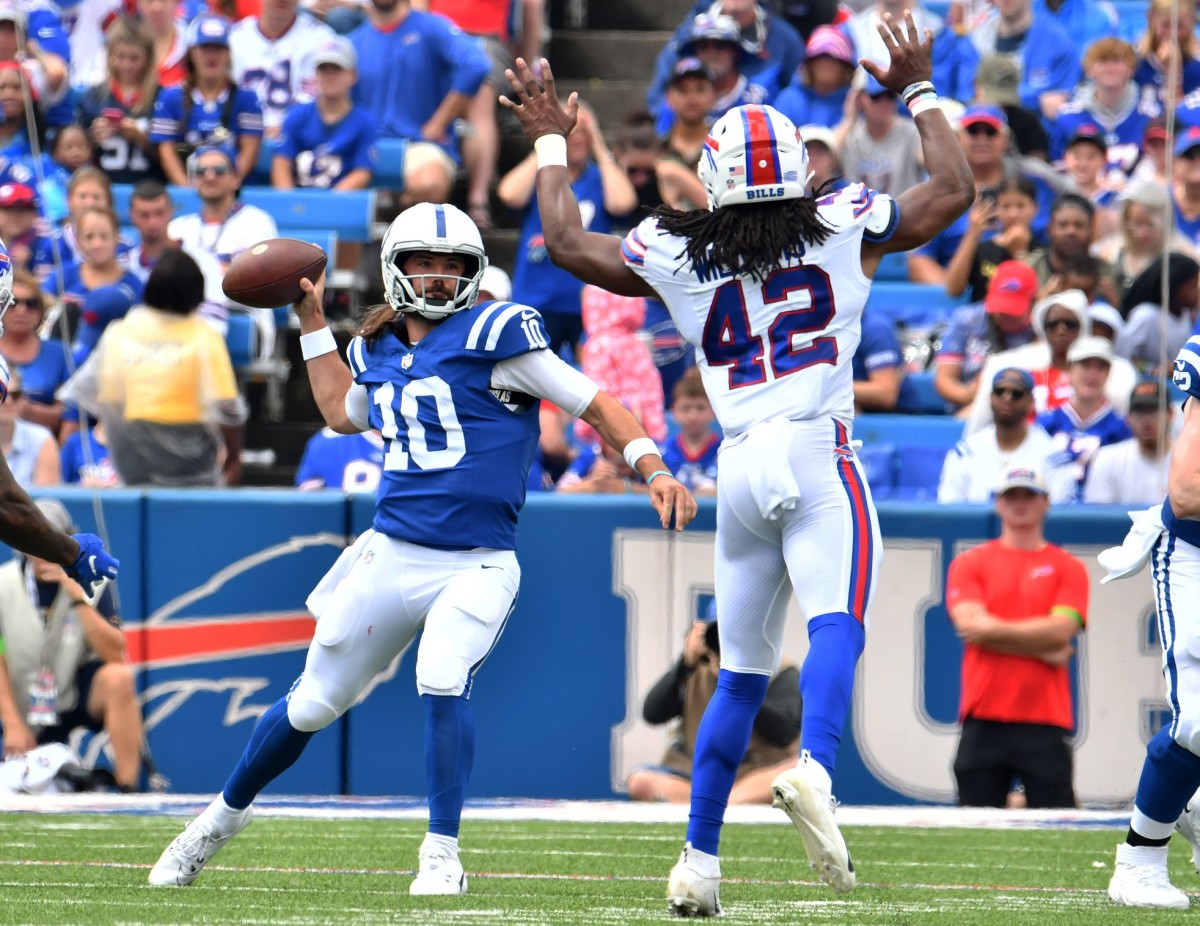 Bills linebacker Dorian Williams attempts to bat down former Eagles quarterback Gardner Minshew's pass.
