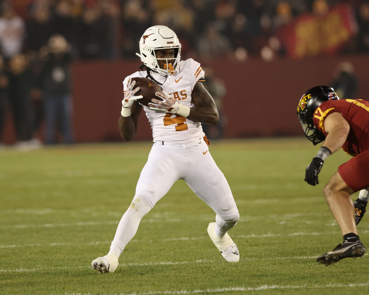 Nov 18, 2023; Ames, Iowa, USA; Texas Longhorns running back CJ Baxter (4) catches a pass against the Iowa State Cyclones at Jack Trice Stadium. 