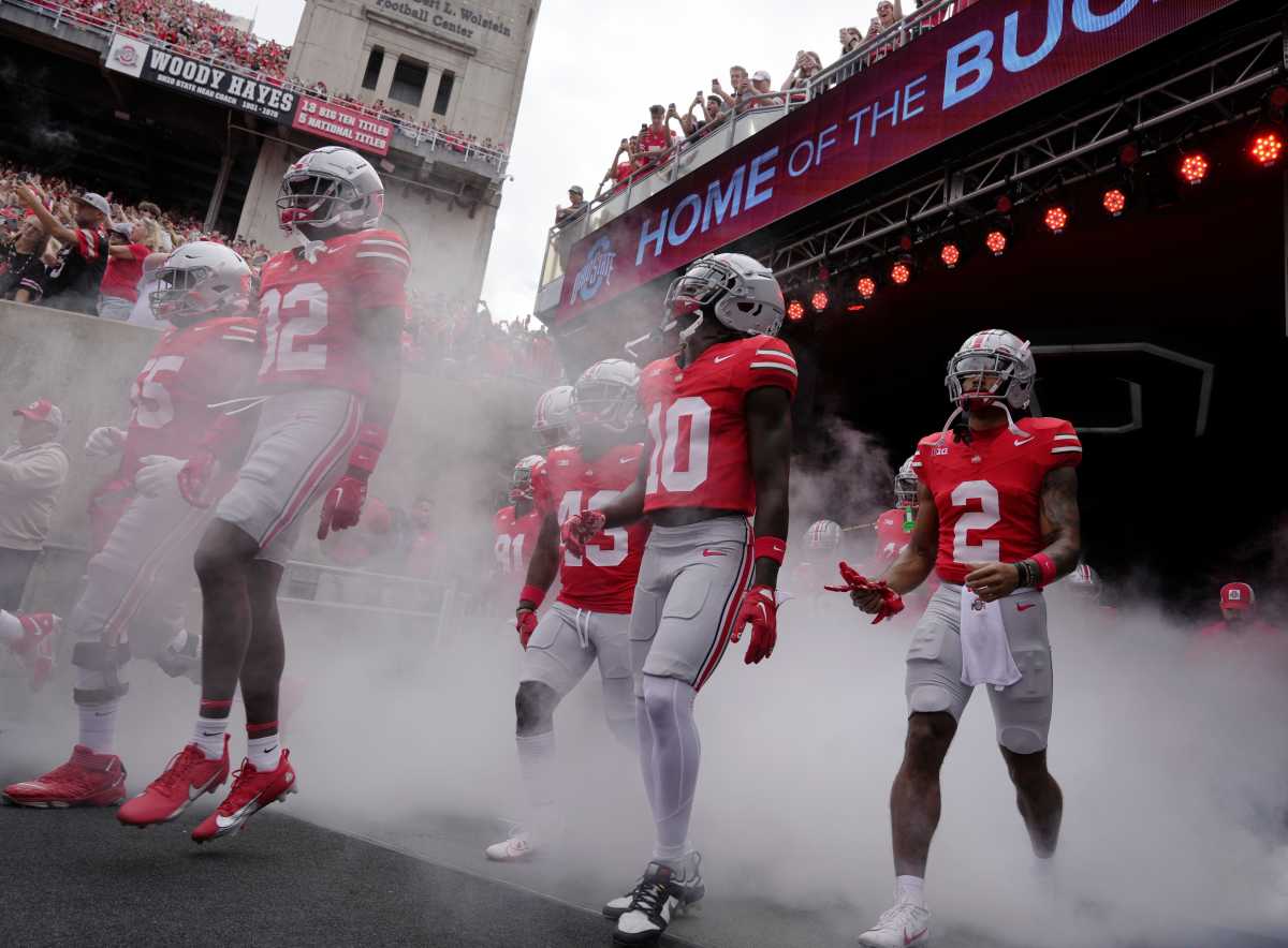 (l-r) Ohio State Buckeyes offensive lineman Matthew Jones (55), Ohio State Buckeyes safety Brenten Jones (32), Ohio State Buckeyes cornerback Denzel Burke (10) and Ohio State Buckeyes wide receiver Emeka Egbuka
