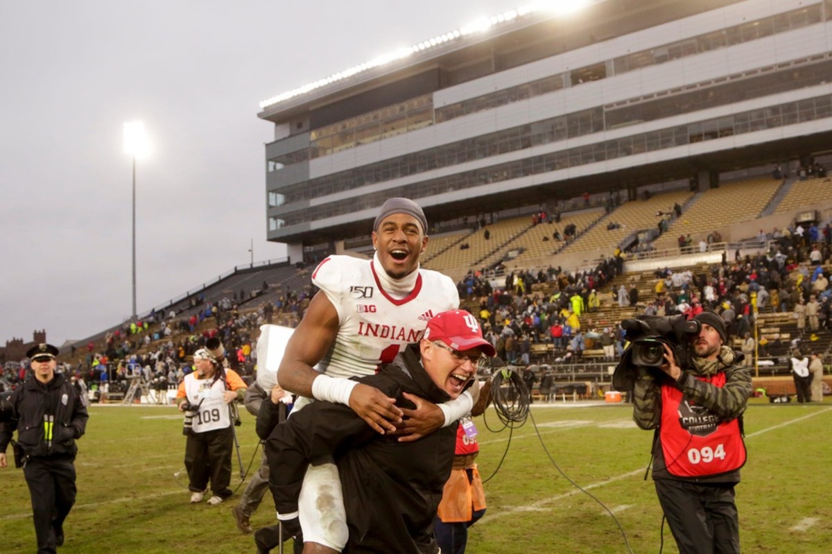Indiana head coach Tom Allen carries Indiana wide receiver Whop Philyor (1) across the field after defeating Purdue, 44-41 in double overtime to win the Old Oaken Bucket, Saturday, Nov. 30, 2019 at Ross-Ade Stadium in West Lafayette.