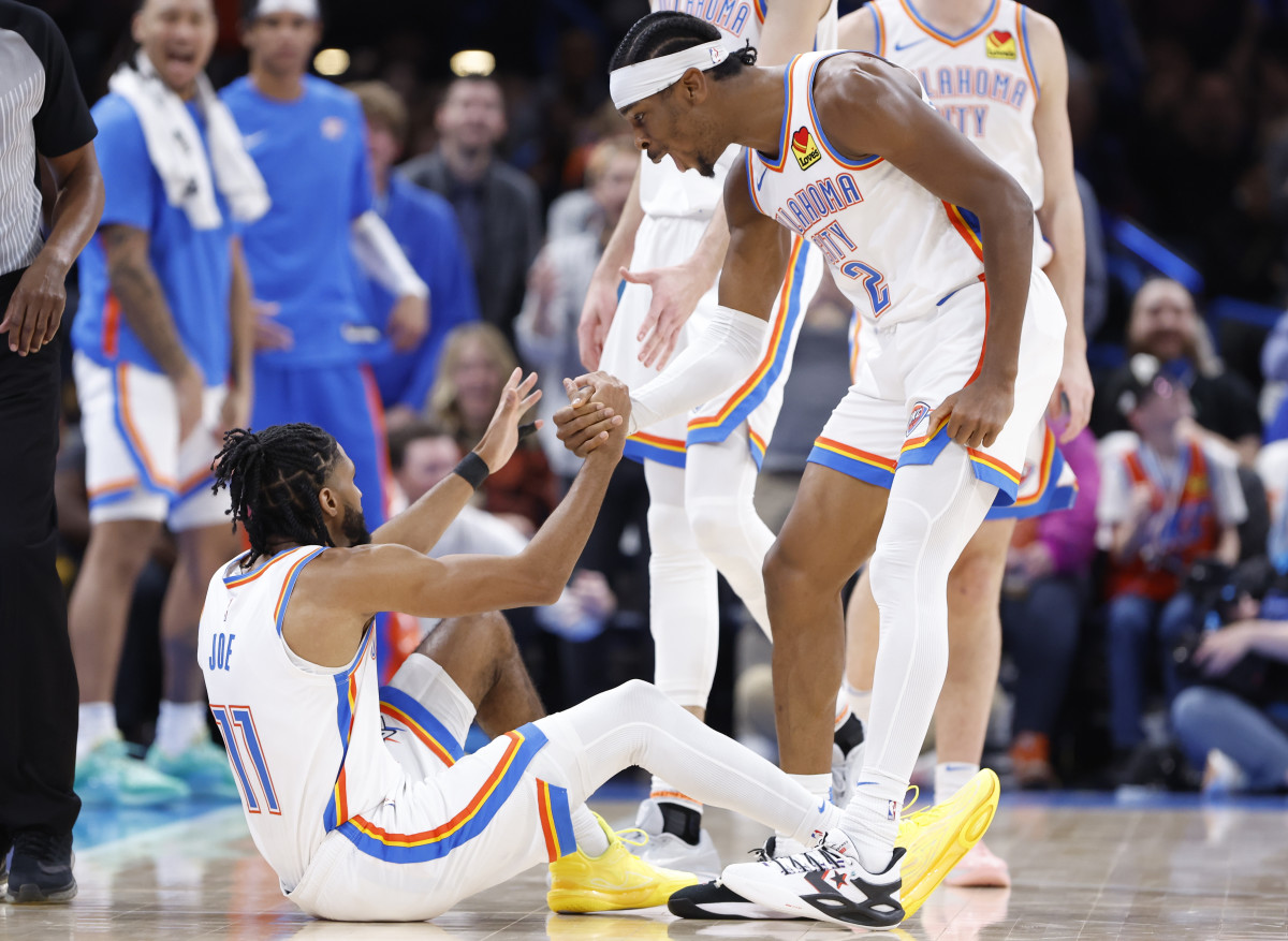 Nov 22, 2023; Oklahoma City, Oklahoma, USA; Oklahoma City Thunder guard Shai Gilgeous-Alexander (2) celebrates with guard Isaiah Joe (11) after scoring a three-point basket and gets the foul during the second half at Paycom Center. Mandatory Credit: