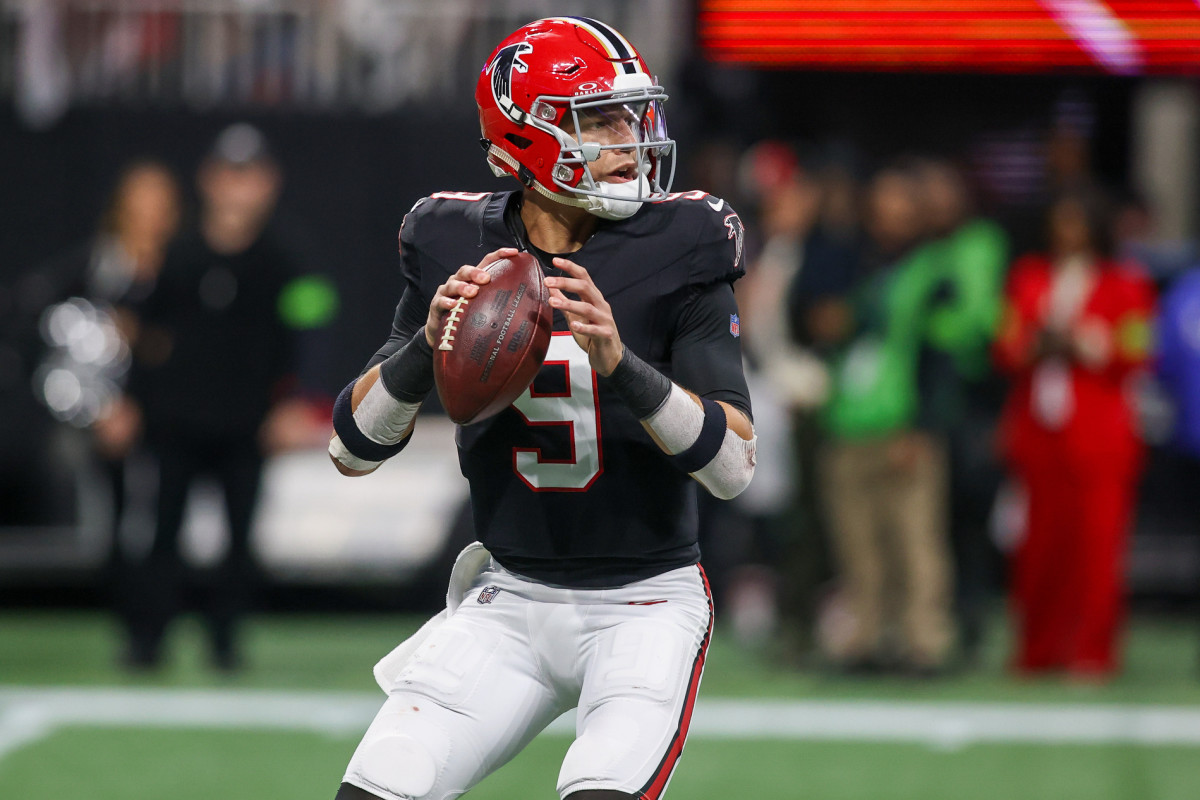Nov 26, 2023; Atlanta, Georgia, USA; Atlanta Falcons quarterback Desmond Ridder (9) drops back to pass against the New Orleans Saints in the second half at Mercedes-Benz Stadium.  