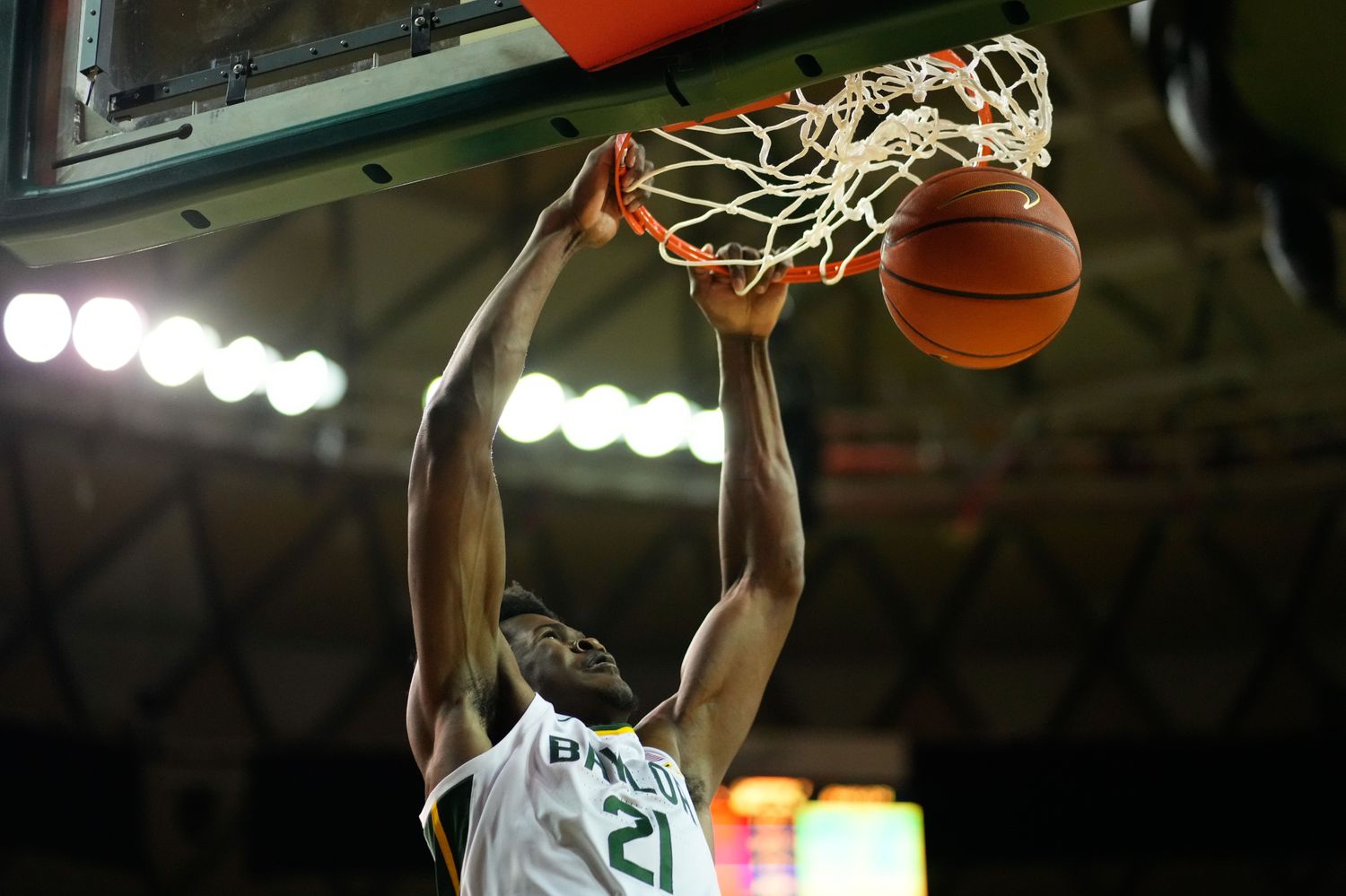 Baylor Bears center Yves Missi (21) dunks against the Nicholls State Colonels during the first half at Ferrell Center.