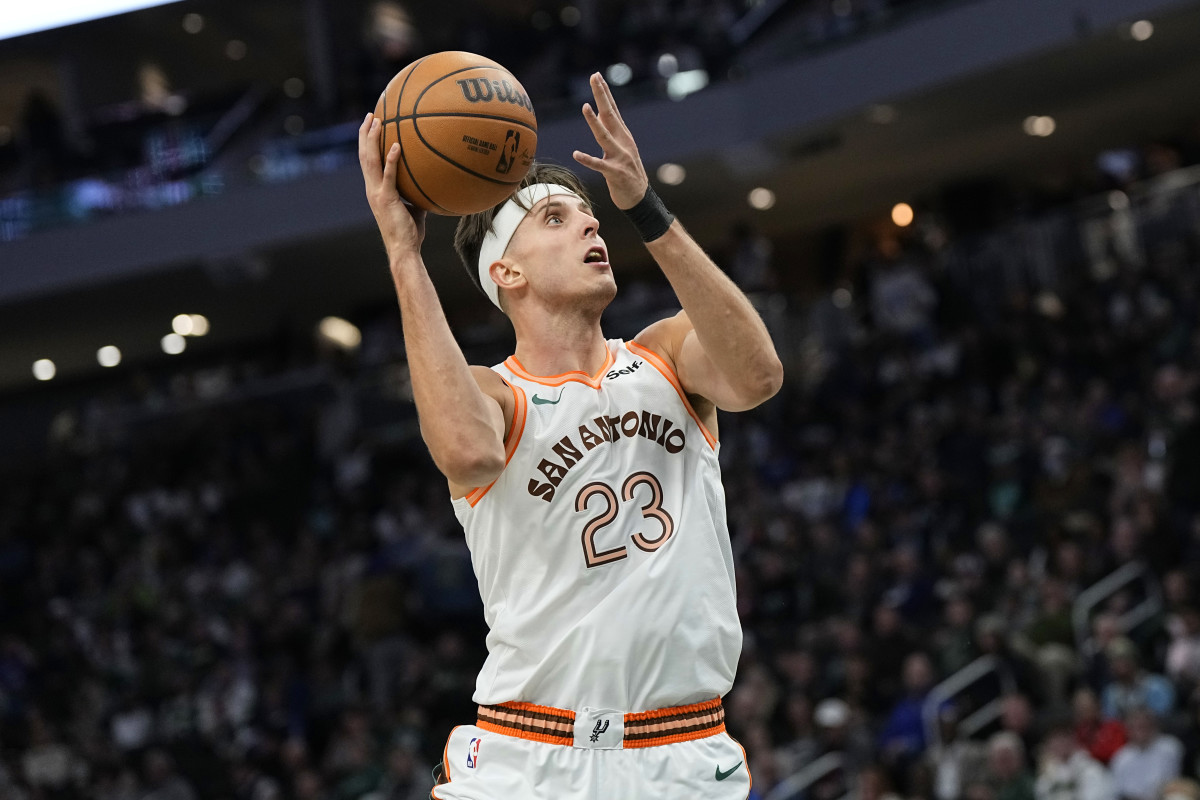 Dec 19, 2023; Milwaukee, Wisconsin, USA; San Antonio Spurs center Zach Collins (23) shoots during the third quarter against the Milwaukee Bucks at Fiserv Forum.