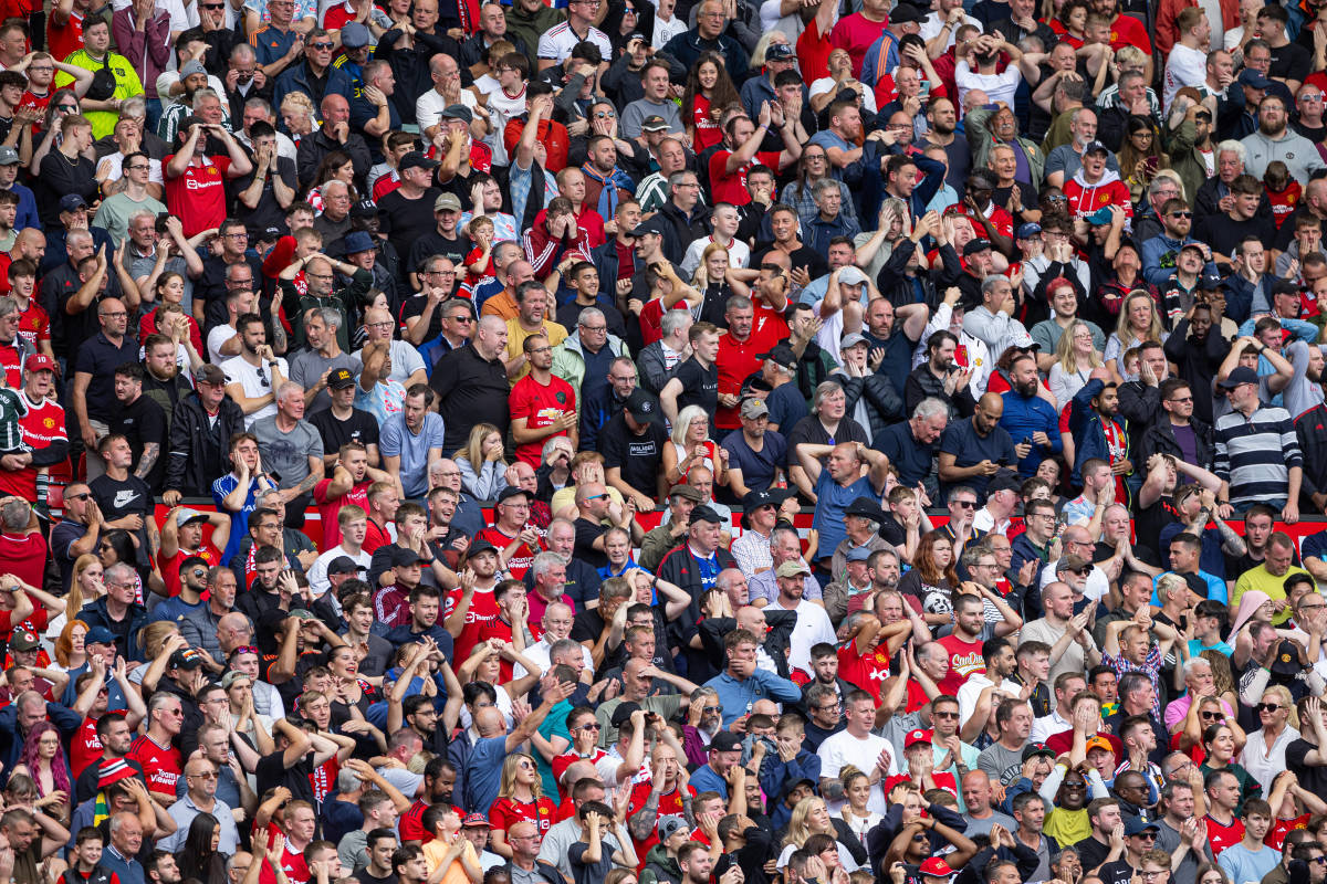 Manchester United fans pictured at Old Trafford during a Premier League game against Nottingham Forest in August 2023