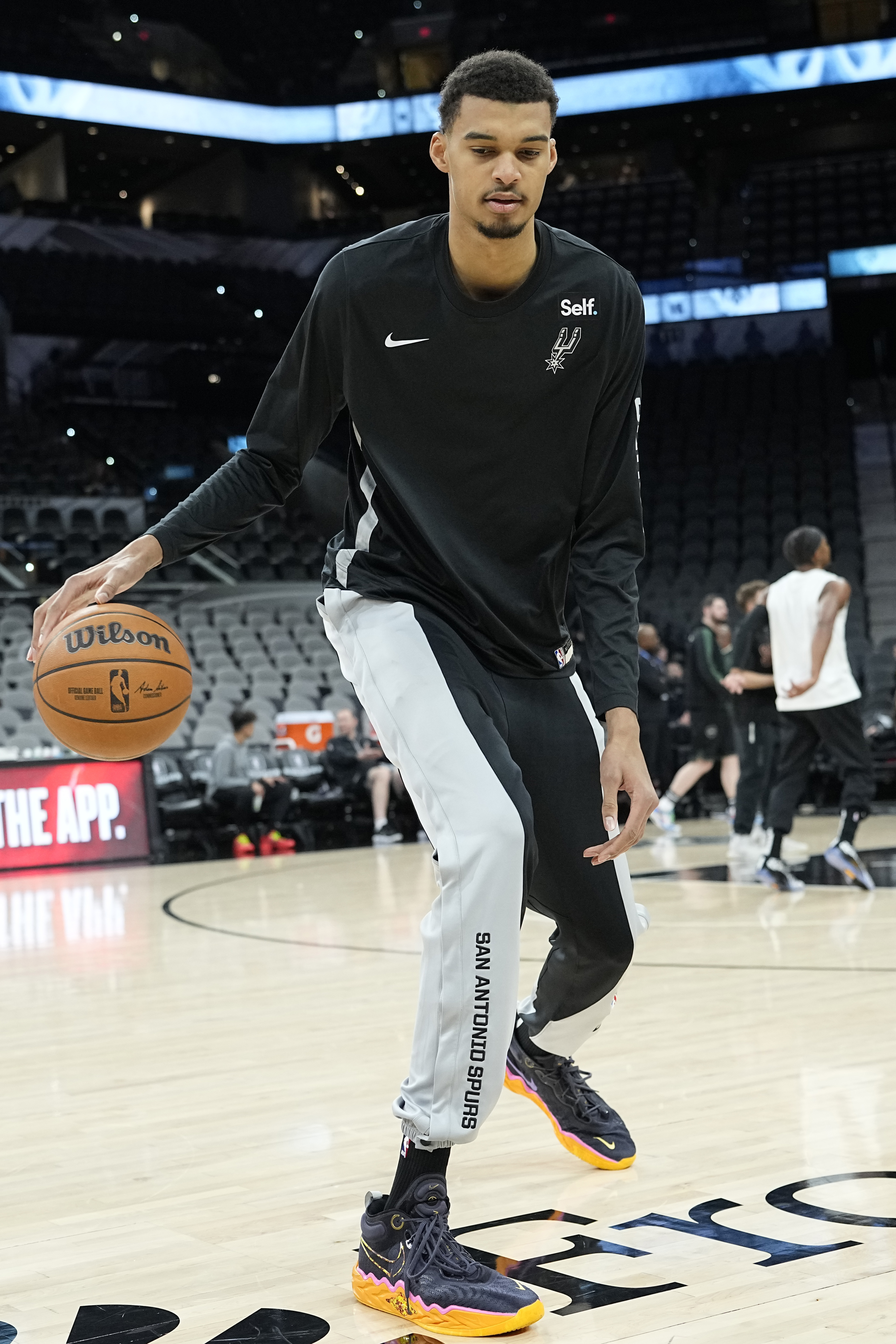 Jan 4, 2024; San Antonio, Texas, USA; San Antonio Spurs forward Victor Wembanyama (1) warms up before a game against the Milwaukee Bucks at Frost Bank Center.