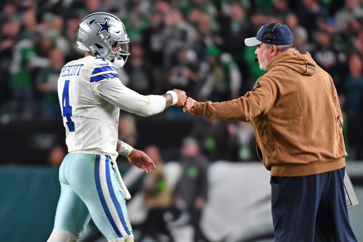 Nov 5, 2023; Philadelphia, Pennsylvania, USA; Dallas Cowboys quarterback Dak Prescott (4) and head coach Mike McCarthy after a touchdown in the third quarter against the Philadelphia Eagles at Lincoln Financial Field. 