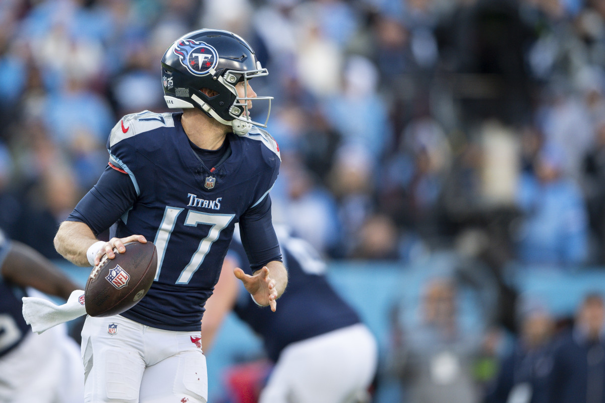Jan 7, 2024; Nashville, Tennessee, USA; Tennessee Titans quarterback Ryan Tannehill (17) rolls out against the Jacksonville Jaguars during the second half at Nissan Stadium. 